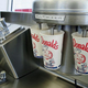 McDonald's milkshake dispenser dispensing into paper cups